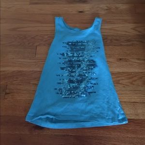 A teal sequined tank top.